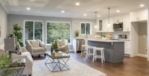 Beautiful open-plan kitchen and living space with modern design elements. Let Dogwood Remodeling transform your home with expert craftsmanship and customized solutions.