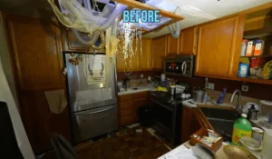 A cluttered and damaged kitchen in need of renovation, with exposed wiring and outdated appliances. Hire a professional contractor to ensure your kitchen remodel is done right.