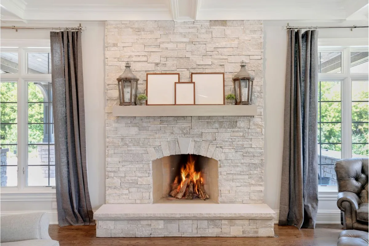 gorgeous stone fireplace with qood mantel